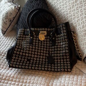 Michael Kors Black Satchel with Gold Eyelets